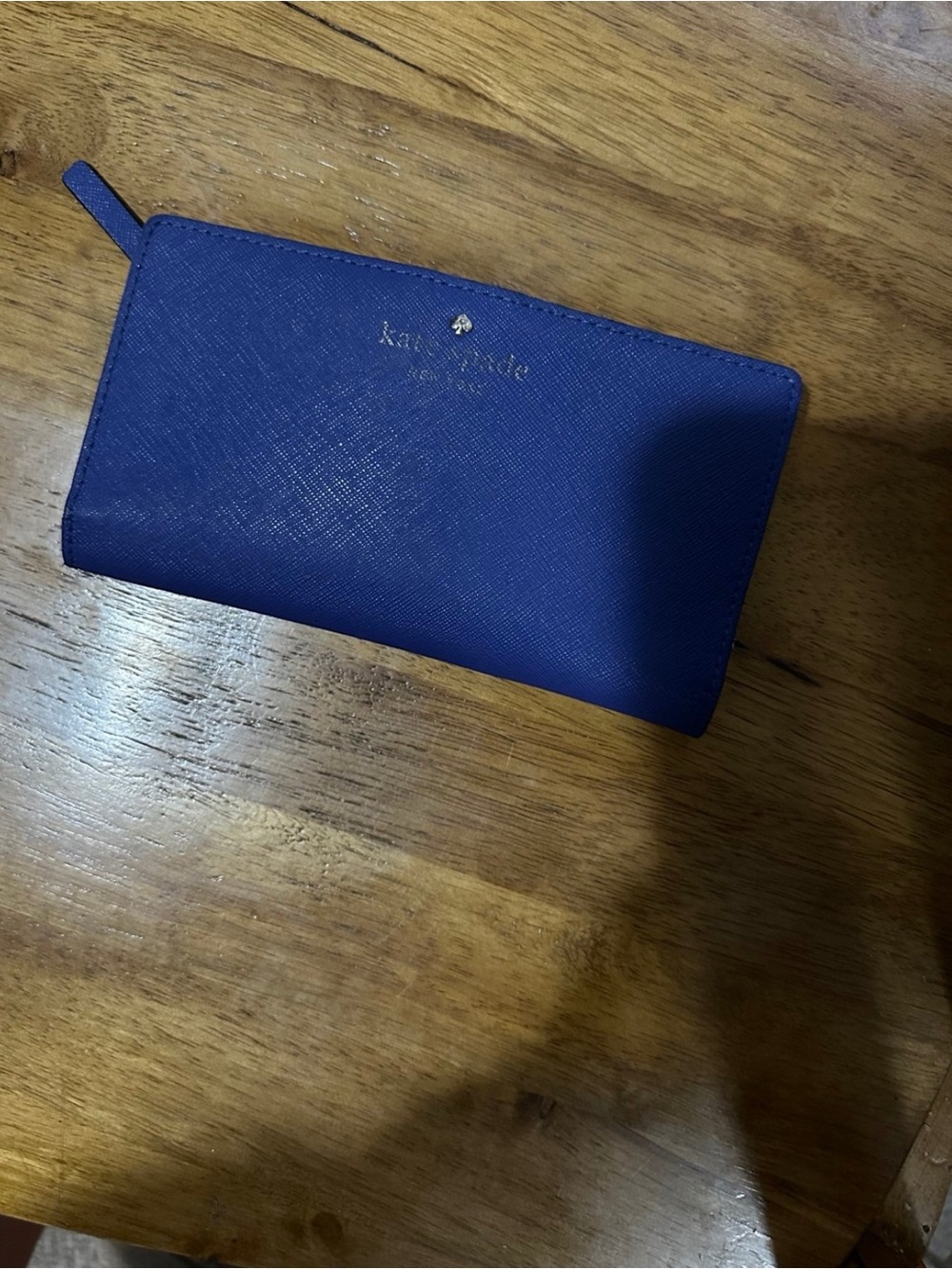 kate spade cobalt blue zip wallet with gold logo
